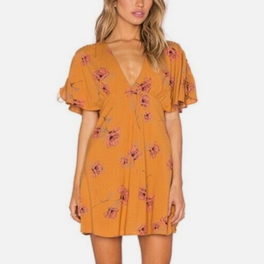 Free People Drapey Melanie Printed Mini Dress in mustard floral size 2 BOHO